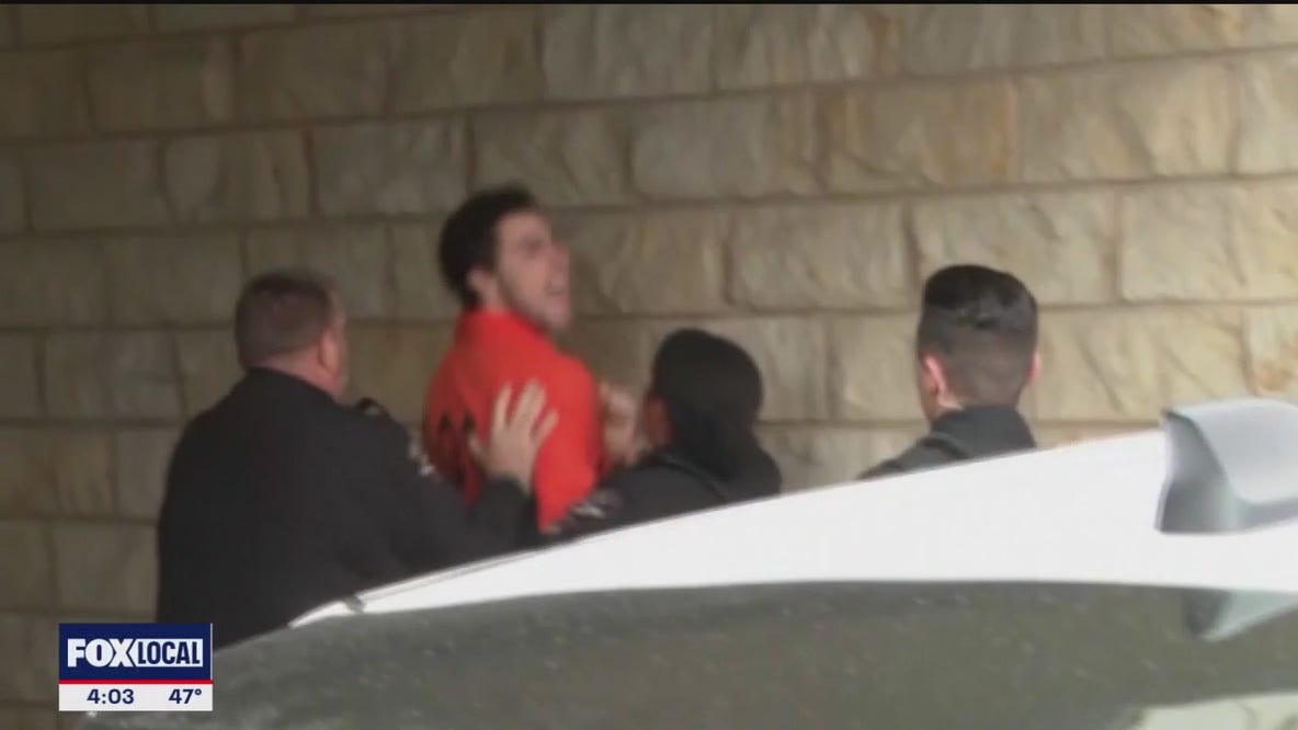 CEO shooting suspect shouts as he appears in court